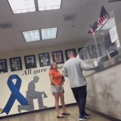 Woman filing a repot at a police department advocates for shooting homeless people