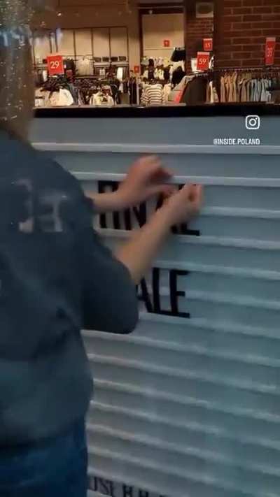 Store signage [loud music]