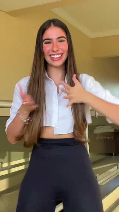 TikTok in white top