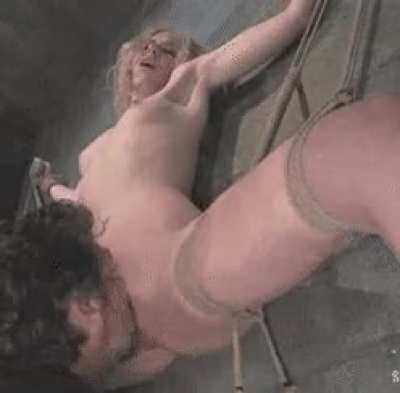 Tied up girl gets her pussy licked