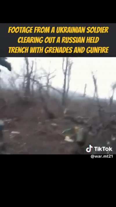 Ukrainian soldiers clearing out trenches with gunfire and grenades. 