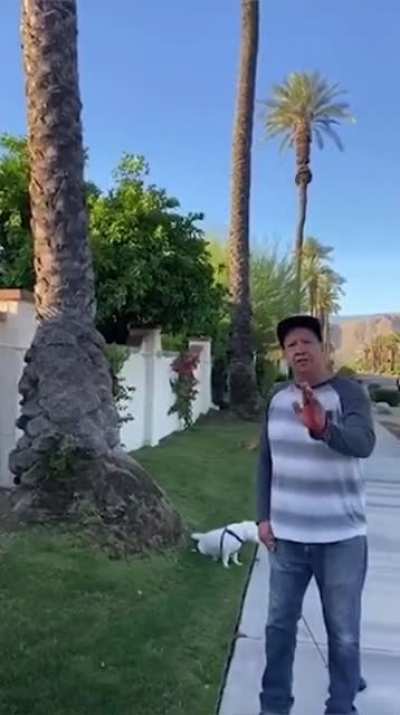 Girl wants guy to put his dog on a leash , guy refuses