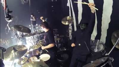 Korn and Slipknot performing Beastie Boys’s “Sabotage” live in concert.