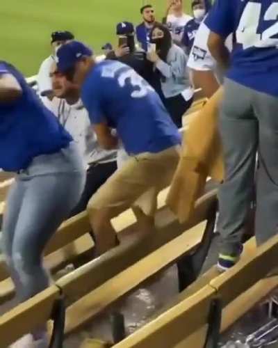 Cheer or Sit Down, Shut-up and Watch The Game, but One Fan Didn't Get The Memo.