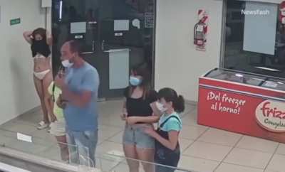 to use her dress as a mask