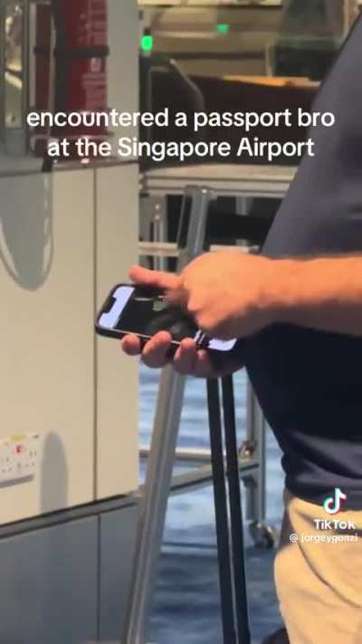 Man desperately swiping right while waiting for flights