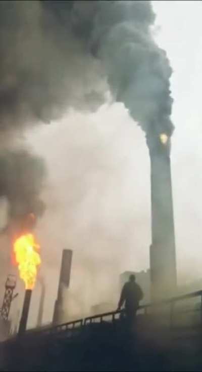 Lighting up a smoke stack with a torch