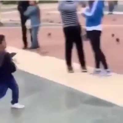 Someone’s bad ass kid flipping the bird to random strangers