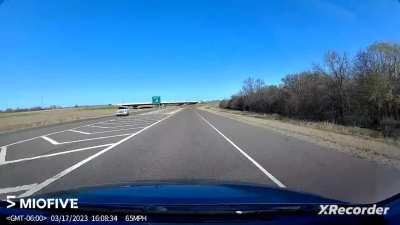 Idiot stopped in the oncoming lane waiting to illegally U-turn.