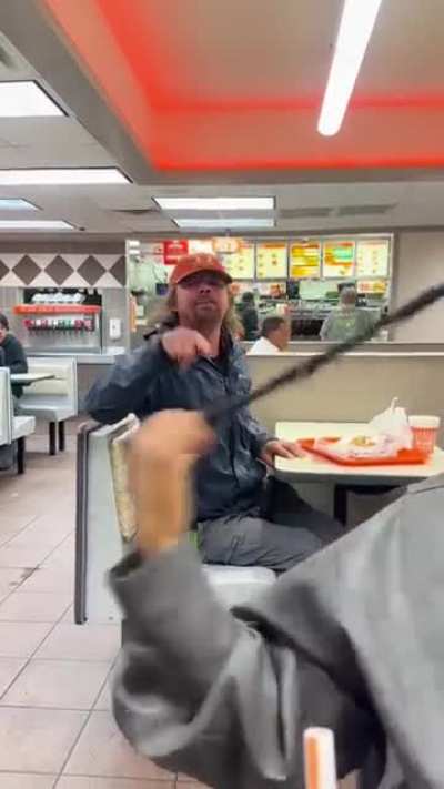 Racist Ken at What a burger in TX harasses these people eating.