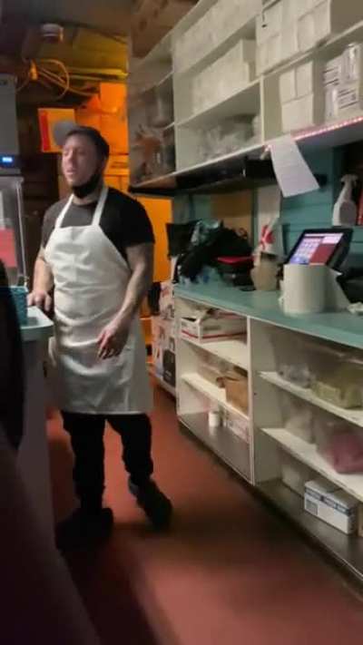 Line cook is having the time of his life