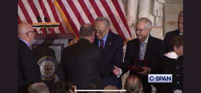 January 6th gold medal recipients ignore replican handshakes during ceremony