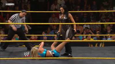 Aksana performing her leg split on Emma