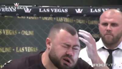 WTF is this face-slapping "sport" (the swollen guy won!)