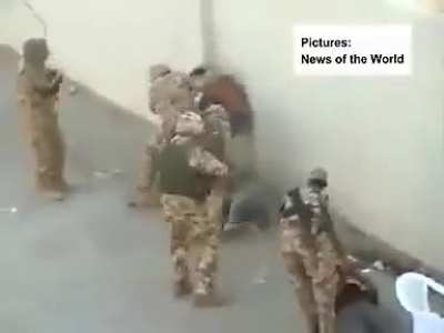 British Soldiers In Iraq Beat 4 Small Kids Hidden In A Compound While An American Soldier Laughs.