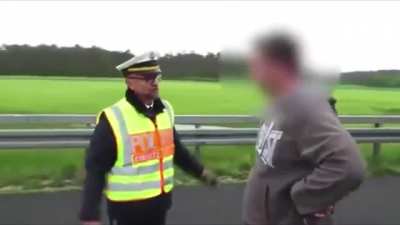 Police officer wont go easy on driver who stops to take pictures of fatal accident.