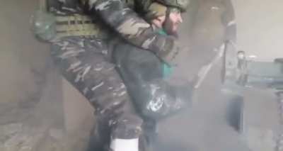 Russian soldiers firing 23MM 2A14 AA gun at Ukrainian positions (date unknown)