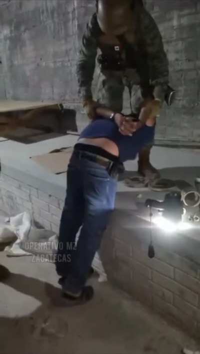 Operativa MZ spanking a man. unsure why