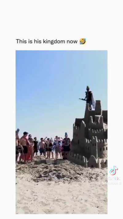 Giving bf a shovel at the beach