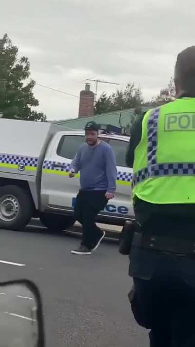 Bloke with a knife surrounded by cops gets mowed down.. by a Subi!