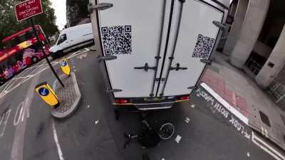 Jeremy Vine gets pinned between his bicycle and a reversing van who took a wrong turn.