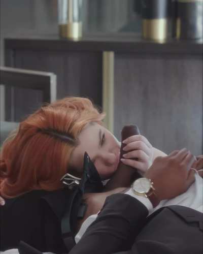 Red haired brace faced beauty plays with uncut cock