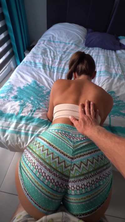 Standing booty rub in tight shorts