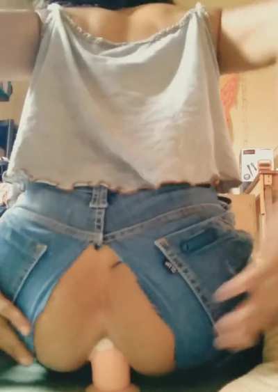 Riding dildo in ripped jeans!