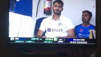 Baapu smiling because he knows he’s going to tonk Aussies when he goes to bat
