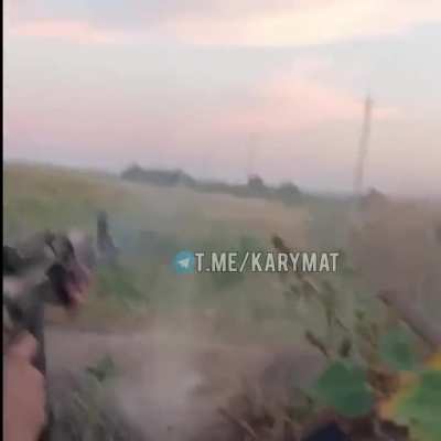 Russian soldiers equipped with a Drone detector attempt to shoot down an FPV drone but it hits a Bukhanka instead.