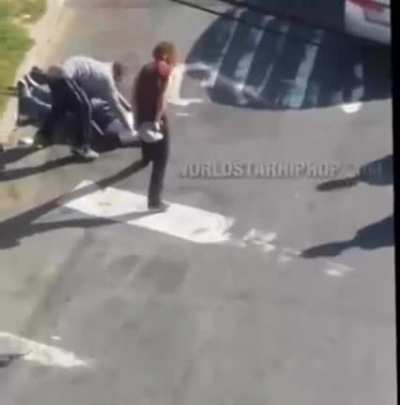 Guy gets stomped by two dudes