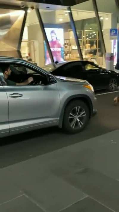 Man walks in the middle of the road
