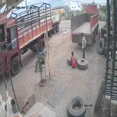 Idiots inflating truck tire