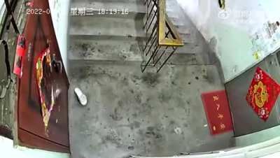 In China, a man wearing the raincoat attacked a woman and her daughter