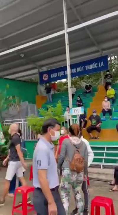Vietnamese citizens after being told they will be receiving the Sinopharm vaccine.