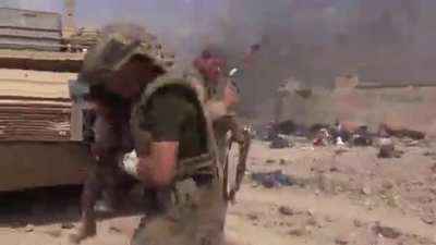 Soldier with balls of steel runs through intense gun fire to save life