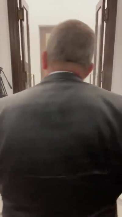 A far right polish deputy forcibly extinguishes menorah 