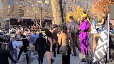 During post election celebrations a man without a mask sucker punched a Biden supporter and is immediately arrested