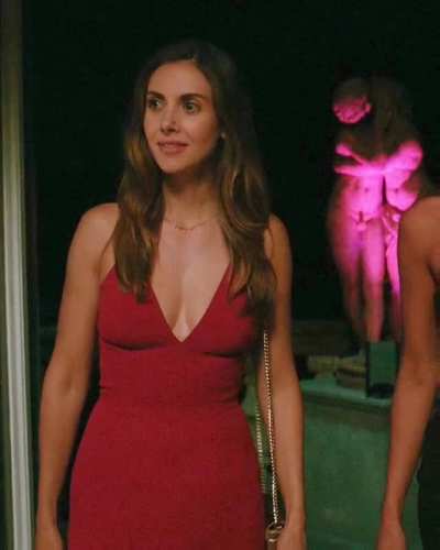 Alison Brie in the "Spin Me Round" red dress