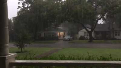 Enjoying the rain from my front porch.