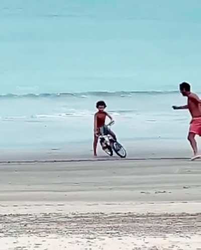 A heart melting moment of a father teaching his son how to ride a bicycle. I live for these moments