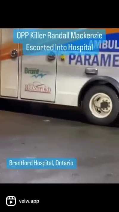 Cop Killer Seen Being Escorted Into Hospital. (🎥 - Veiw News App)
