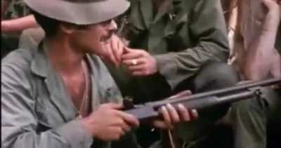 US Marines smoke marijuana through a shotgun