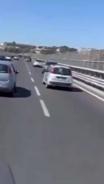 In reverse on the highway in Italy