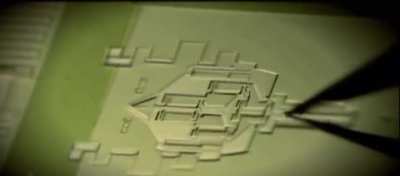 Nano Injector injecting DNA into a cell