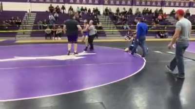 Kid throws blows on my teammate