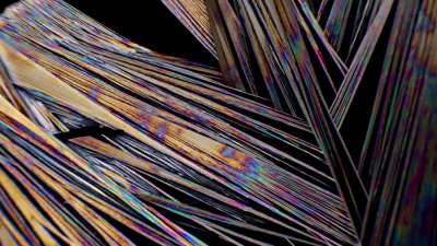 Growing some crystals on a microscope slide, while lit with cross-polarized light.