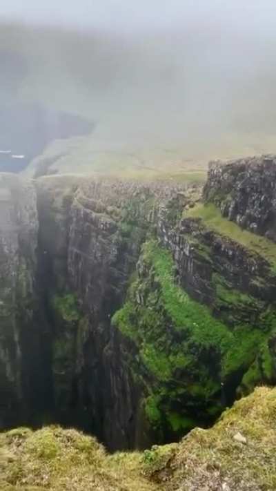 Incredible cliffs in The Faroe Islands. One of the craziest places I&rsquo;ve ever been