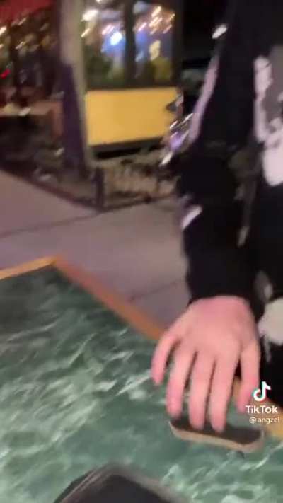 Man shows off his W