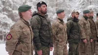 Soldiers from NATO countries &mdash; Denmark, Latvia, Spain, and the United States &mdash; sing "Carol of the Bells" in a snowy forest in rural Latvia 🔔